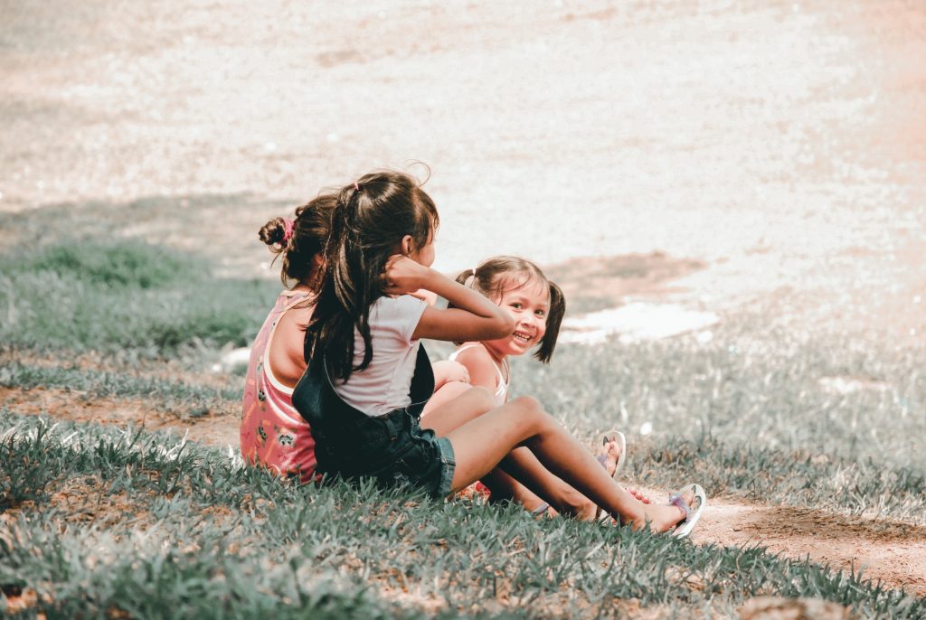 three kids sitting at school without stress and anxiety