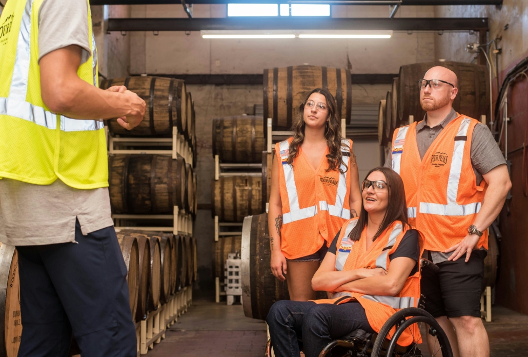 a photo of a diverse workforce with a woman in a wheelchair 