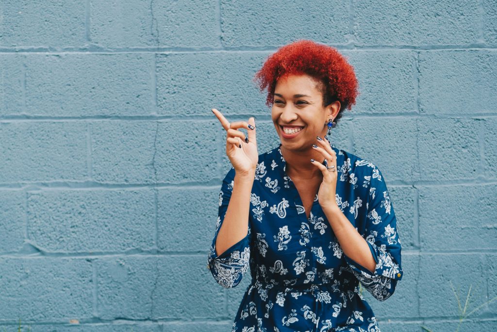 a happy employee showing that employee mental health matters.