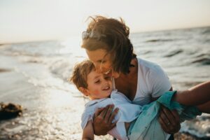 a landscape shot of a woman with her son