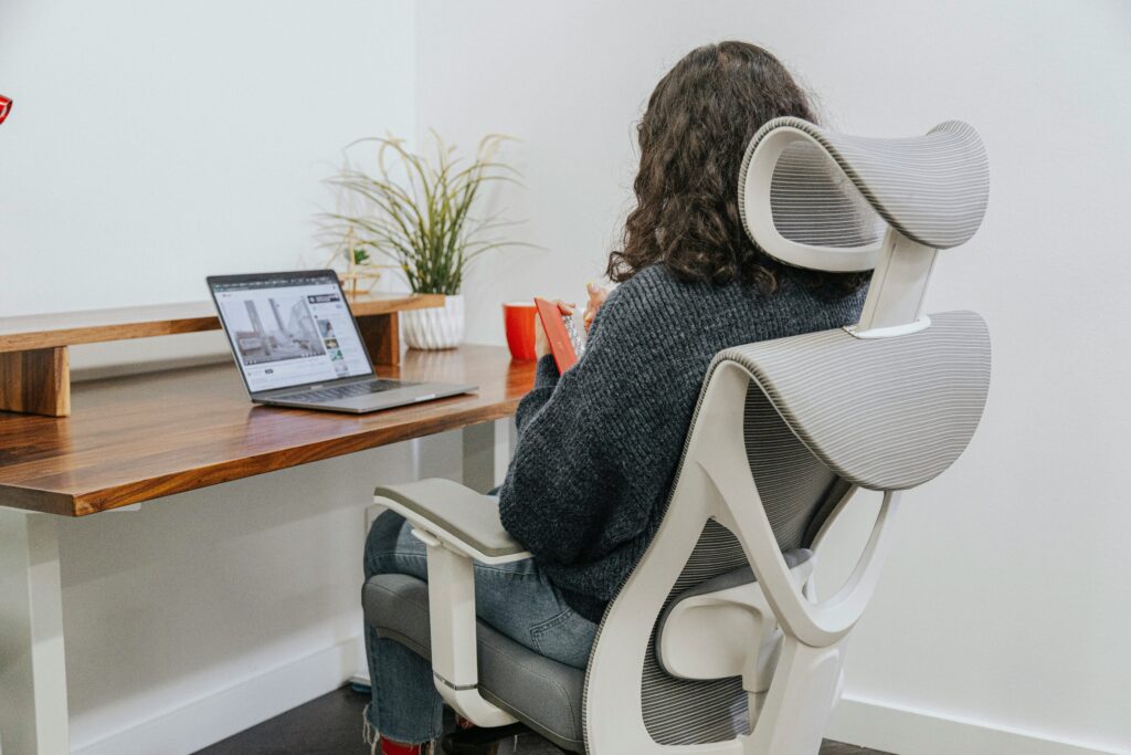 a woman sitting in an Ergonomic chair